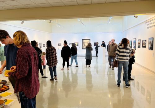 People milling about in MHCC art gallery