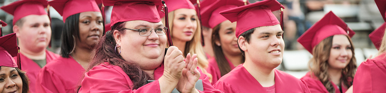 Students clapping at graduation
