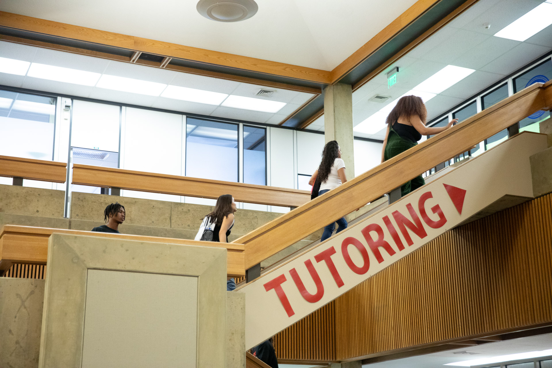 Students walking upstairs to tutoring